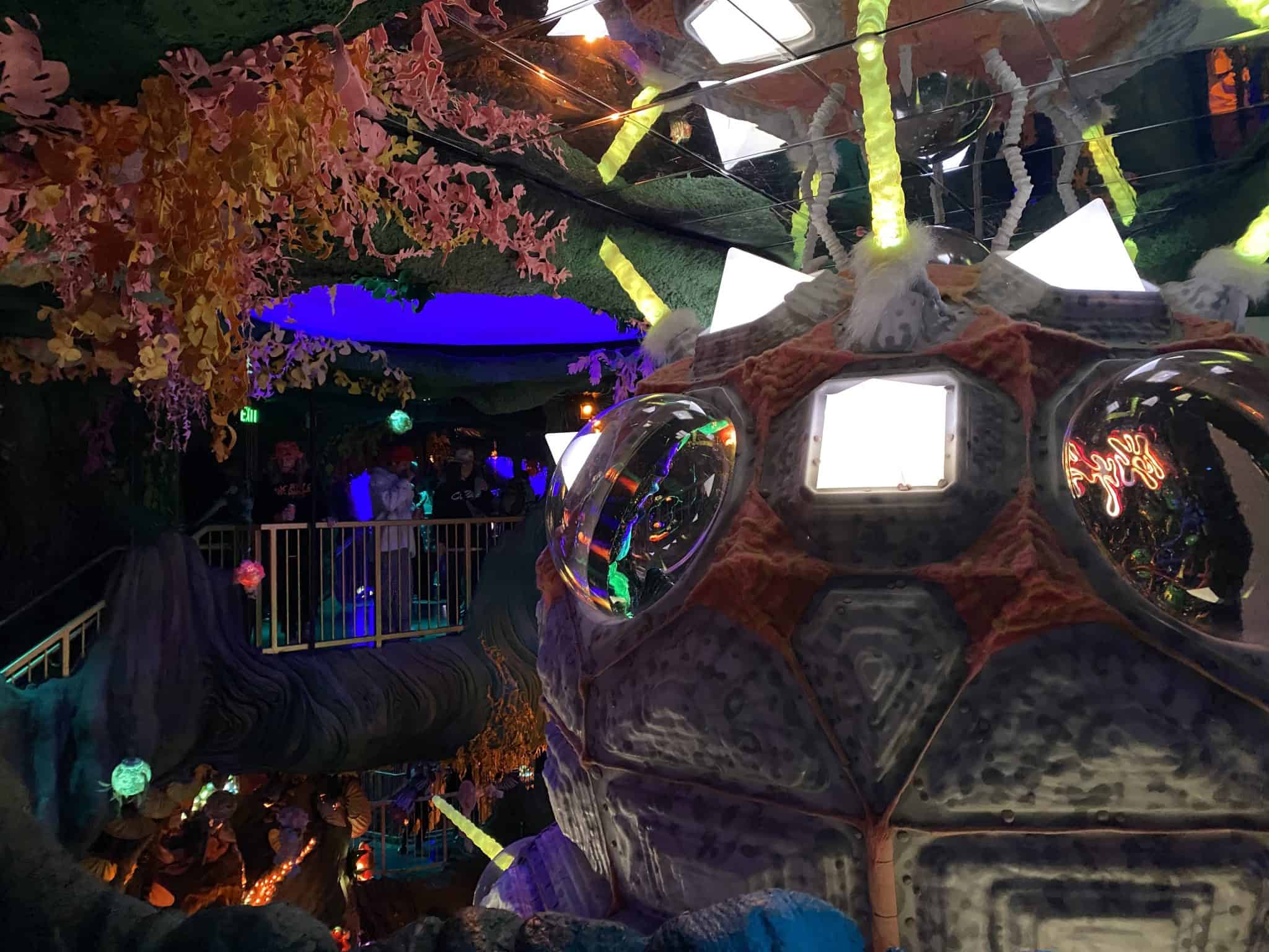 Your Guide To Meow Wolf’s Exhibitions: House Of Eternal Return, Omega 